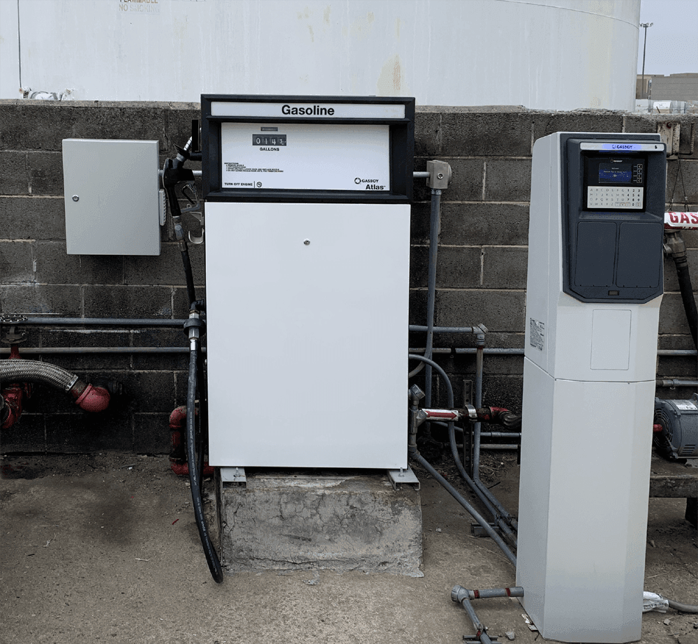 gasboy dispenser with islander fuel management system next to it